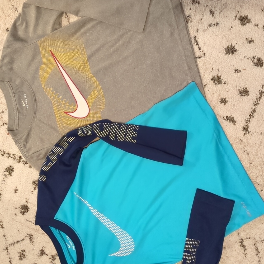 Two Nike Dri-fit long sleeve tops